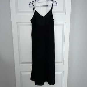 Black swim suit cover up.